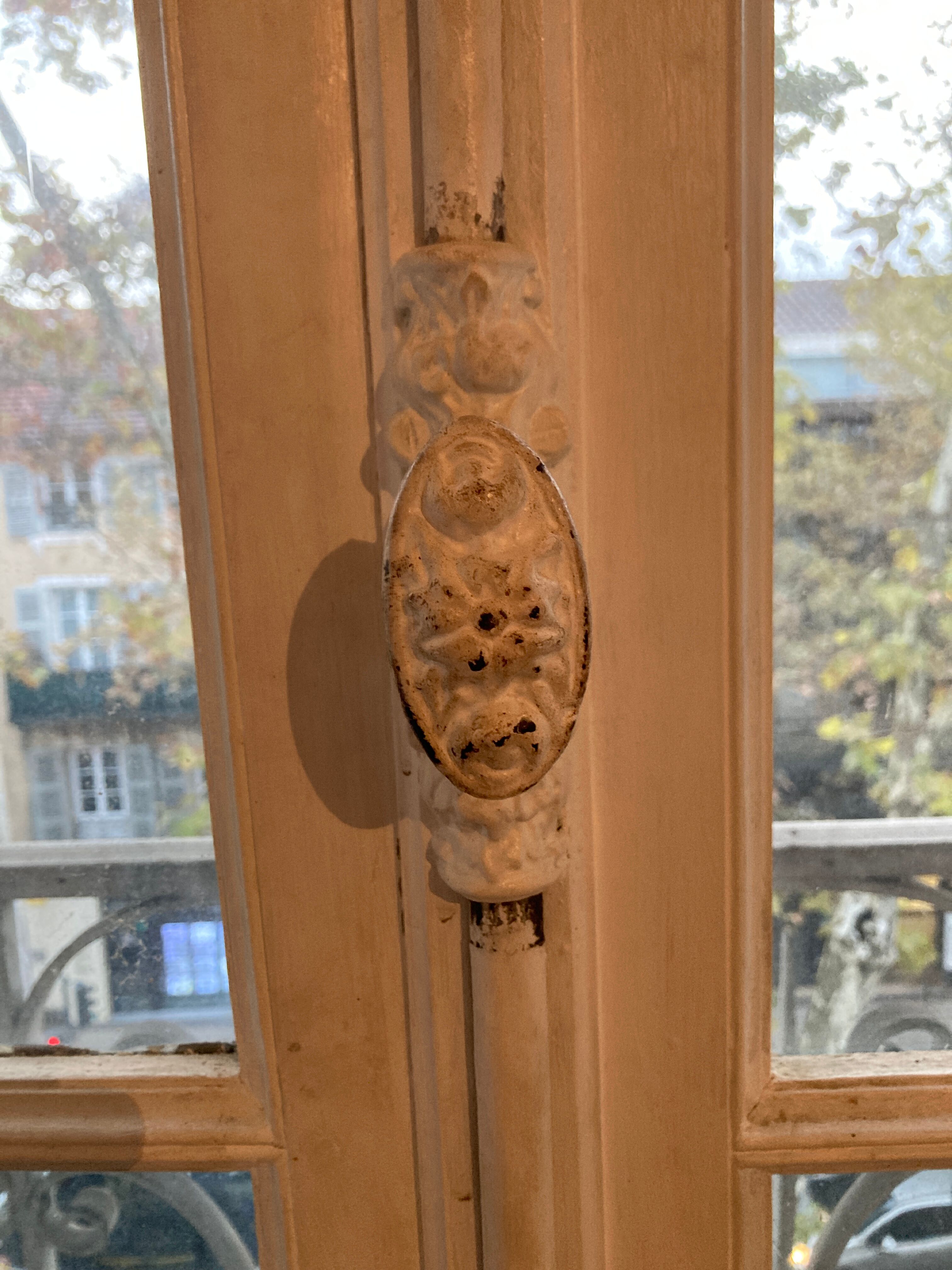 Window with interior shutters