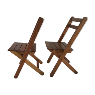 Paire de chaises pliantes au feu de bois