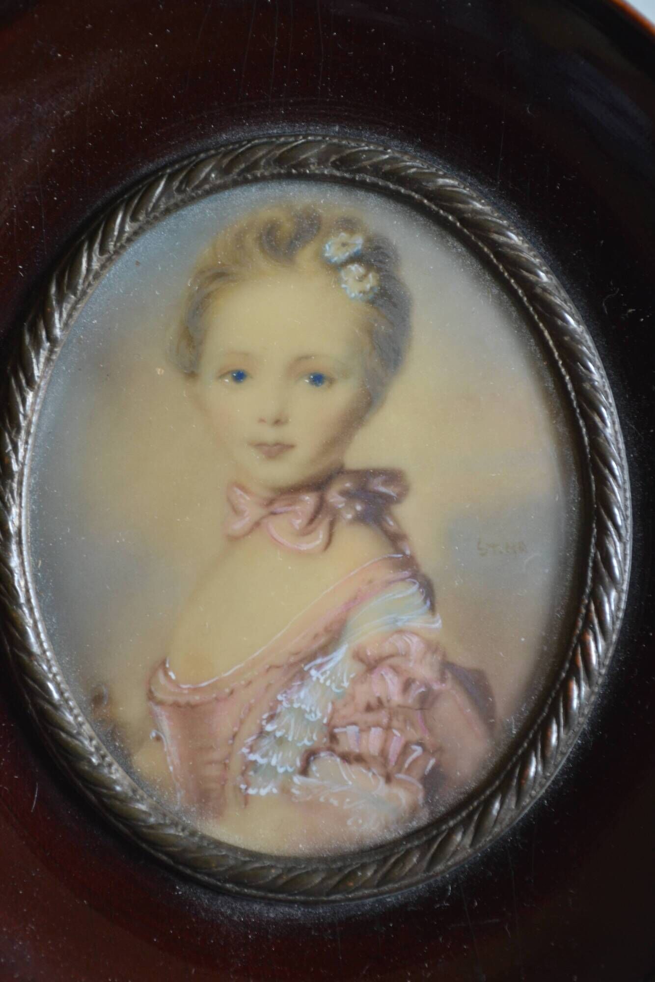 Miniature portrait of a young girl, framed and under glass