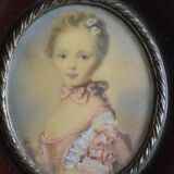 Miniature portrait of a young girl, framed and under glass