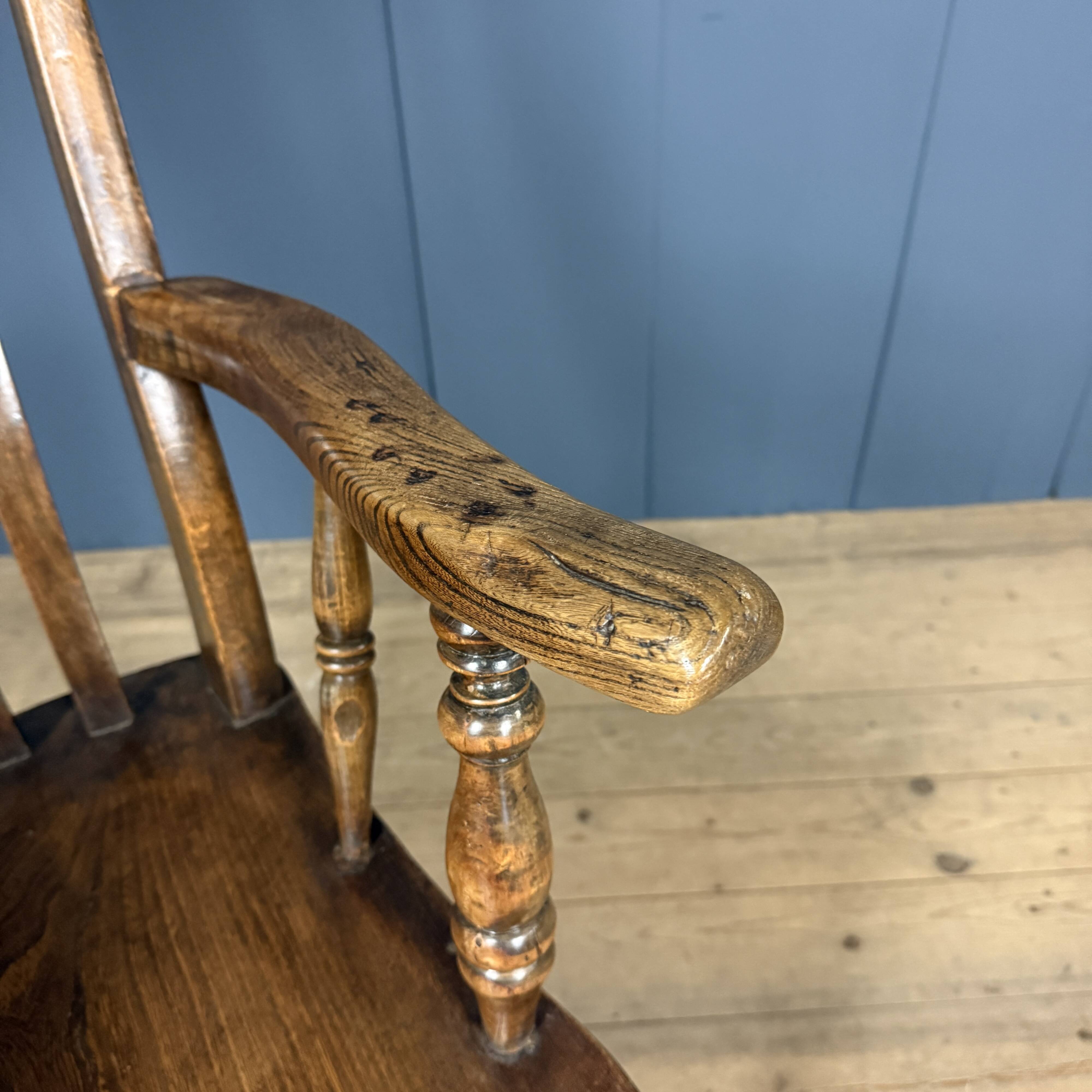 Brown English Windsor armchair with high back