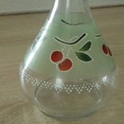 Glass carafe with enamel decoration of cherries.