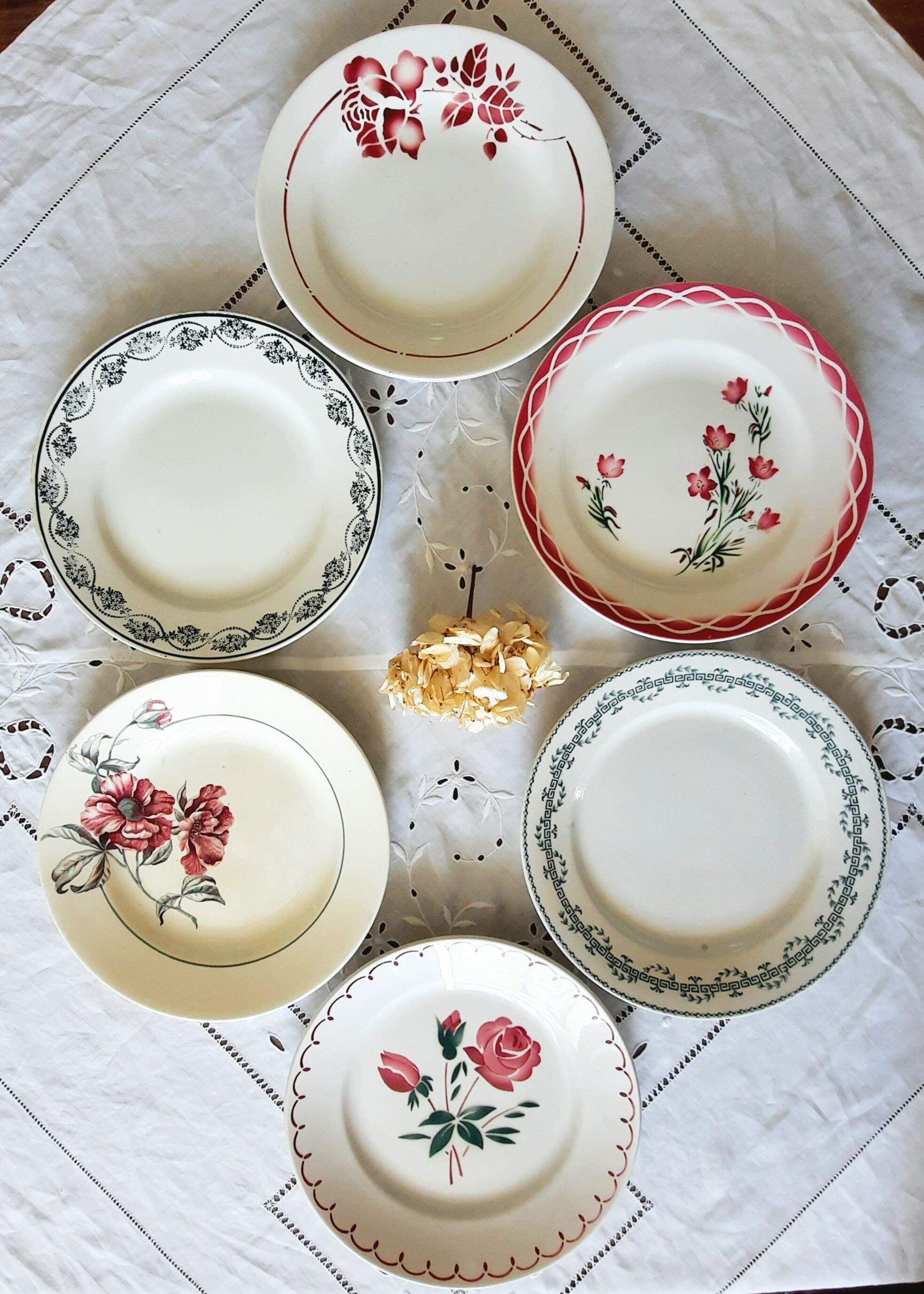 Old flat plates mismatched in earthenware