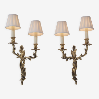 Rococo style gilt bronze wall sconces, acanthus leaf, twin arms, ca, 1950s, French