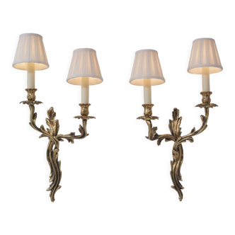 Rococo style gilt bronze wall sconces, acanthus leaf, twin arms, ca, 1950s, French