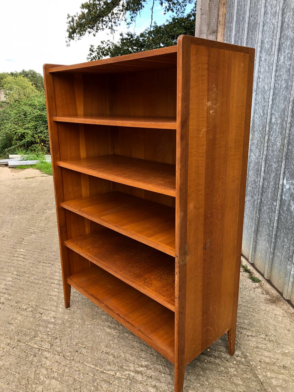 Vintage oak bookcase with compass base