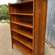 Vintage oak bookcase with compass base