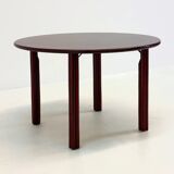 Vintage round dining table in burgundy red