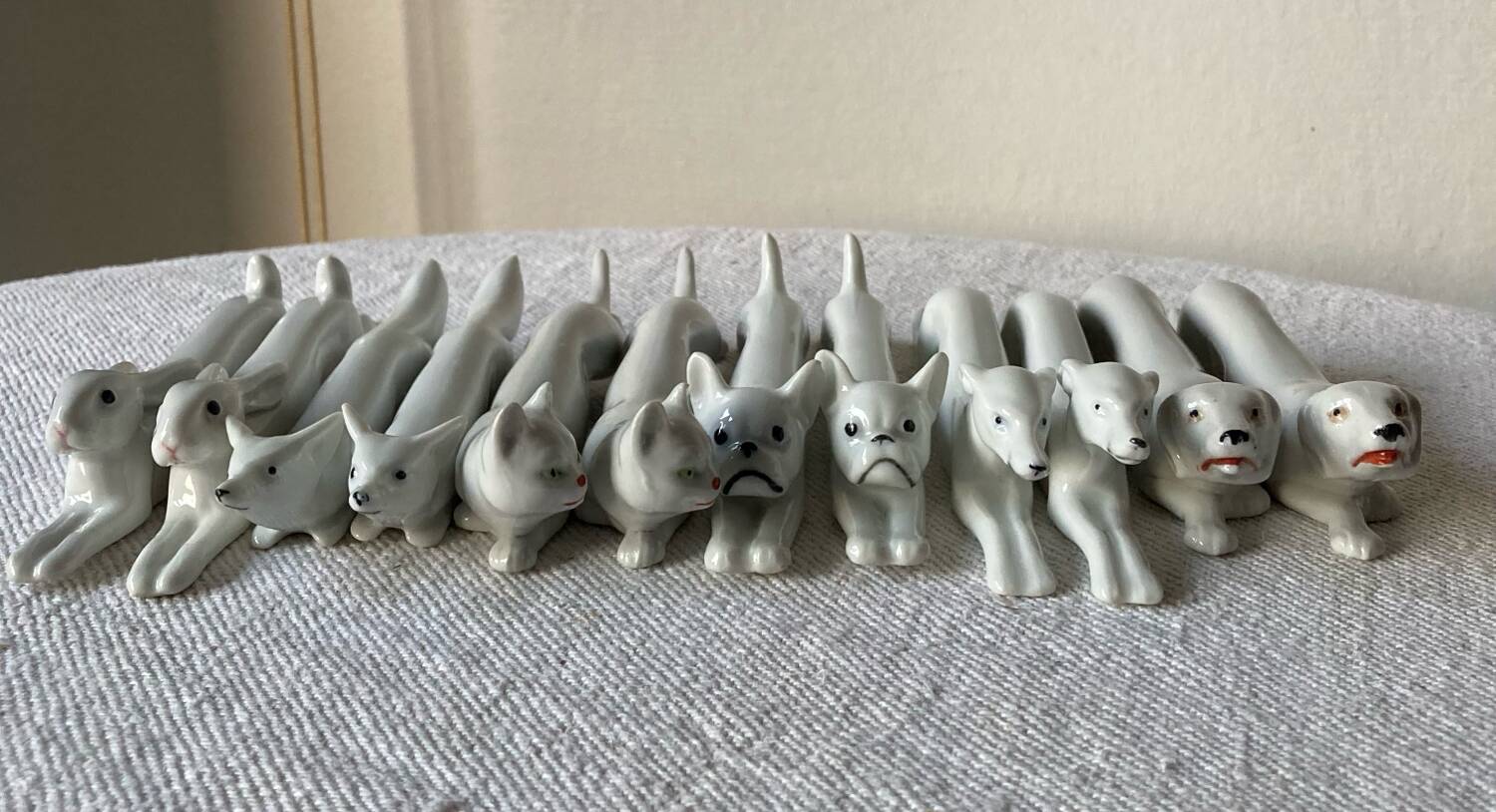12 Art Deco porcelain knife holders