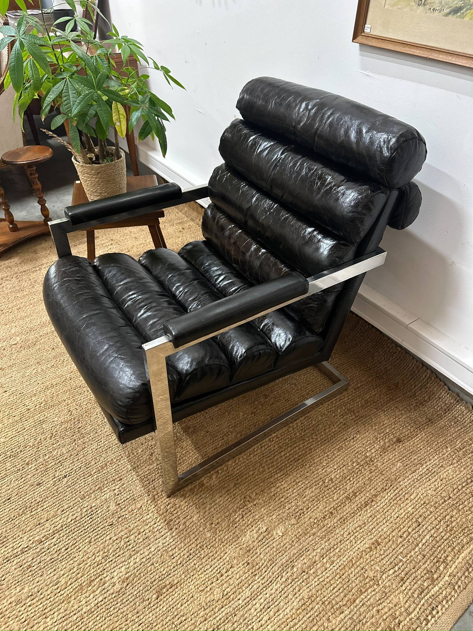 Vintage 1970s black leather armchair – metal frame