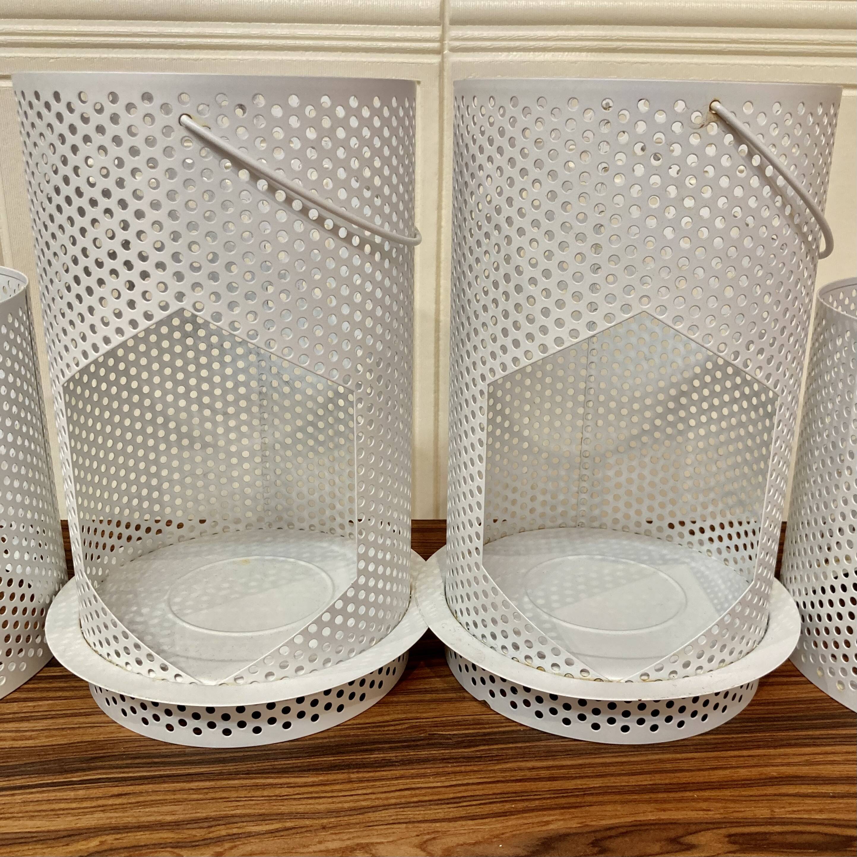 Set of 2 large metal candle holders in scandinavian design.