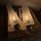 Pair of antique wall sconces brass tulip white striped glass