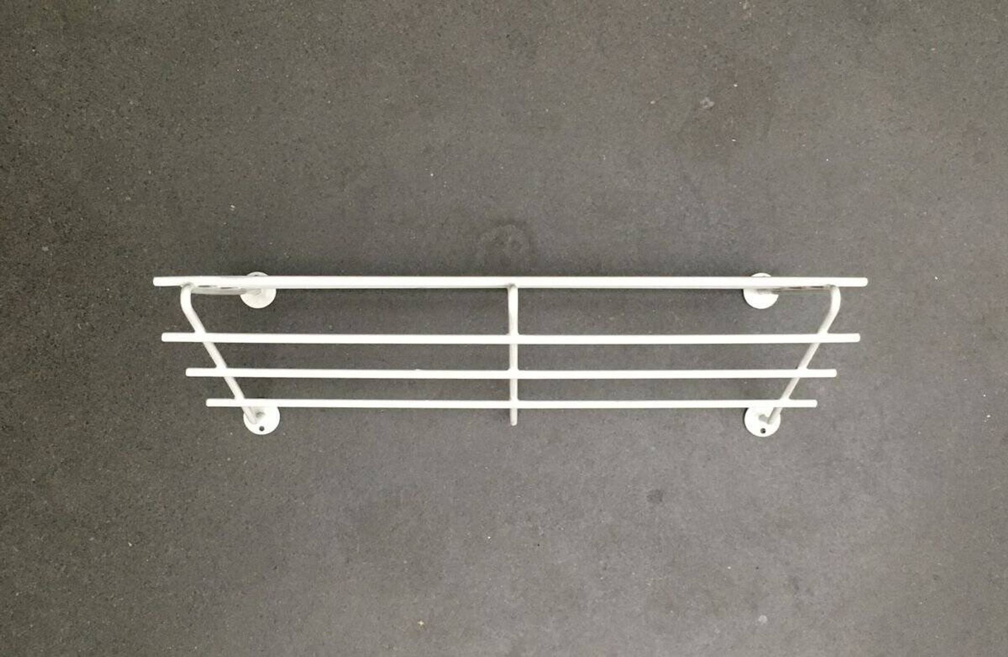 Mid-century modern minimalist metal coat rack from the 1960s.