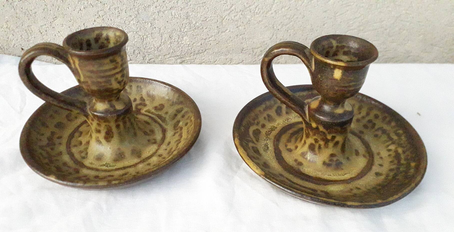 Pair of stoneware candlesticks