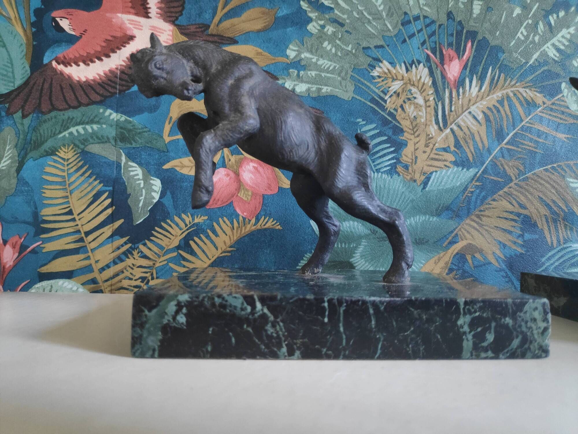 old ibex bookend, base in beautiful black marble veined green