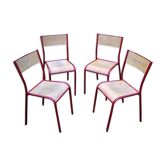 Set of four chairs of red vintage school
