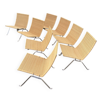 8 PK22 chairs by Poul Kjaerholm, signed Fritz Hansen.