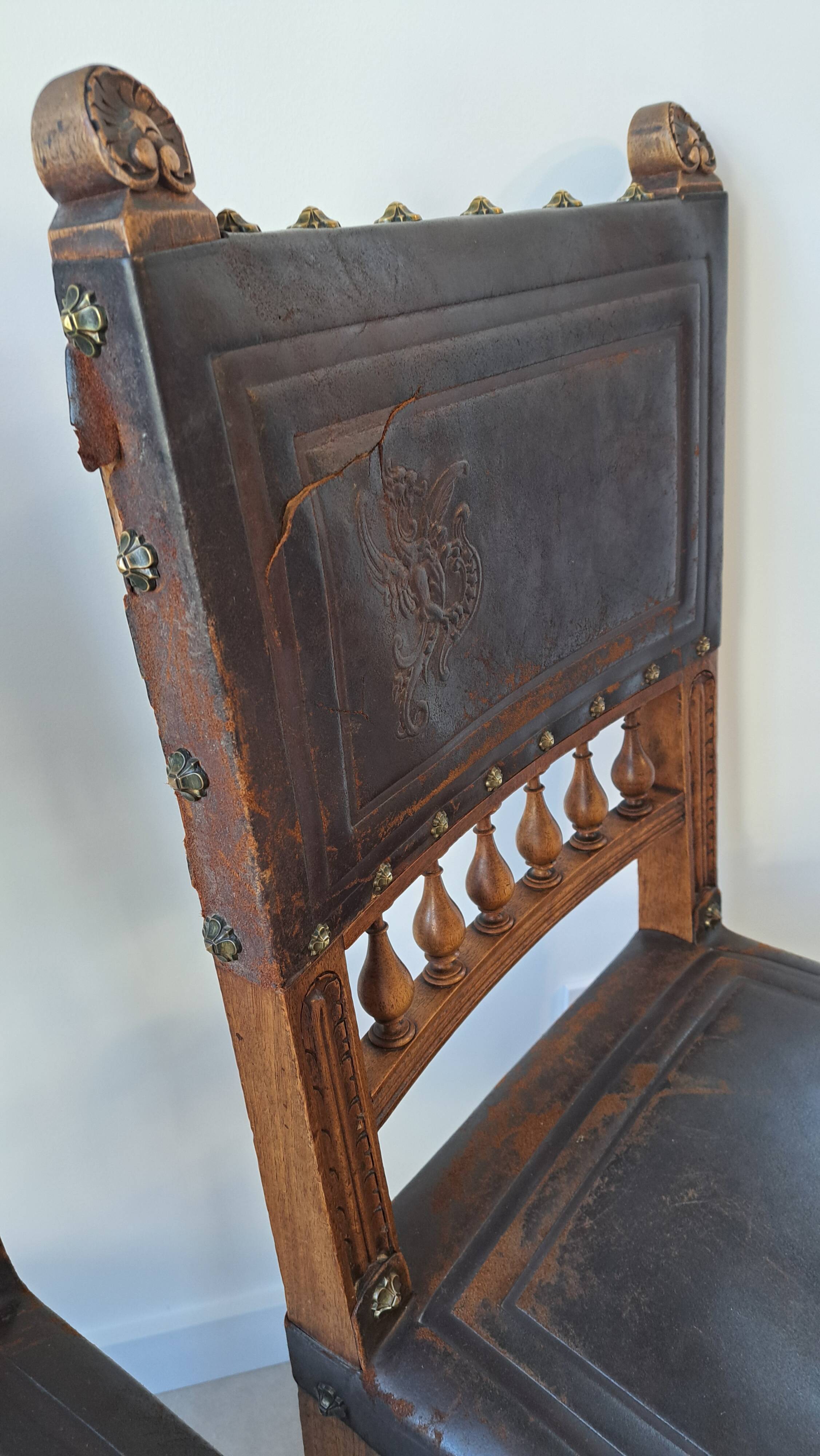 Pair of antique chairs in embossed leather, Henri II style.