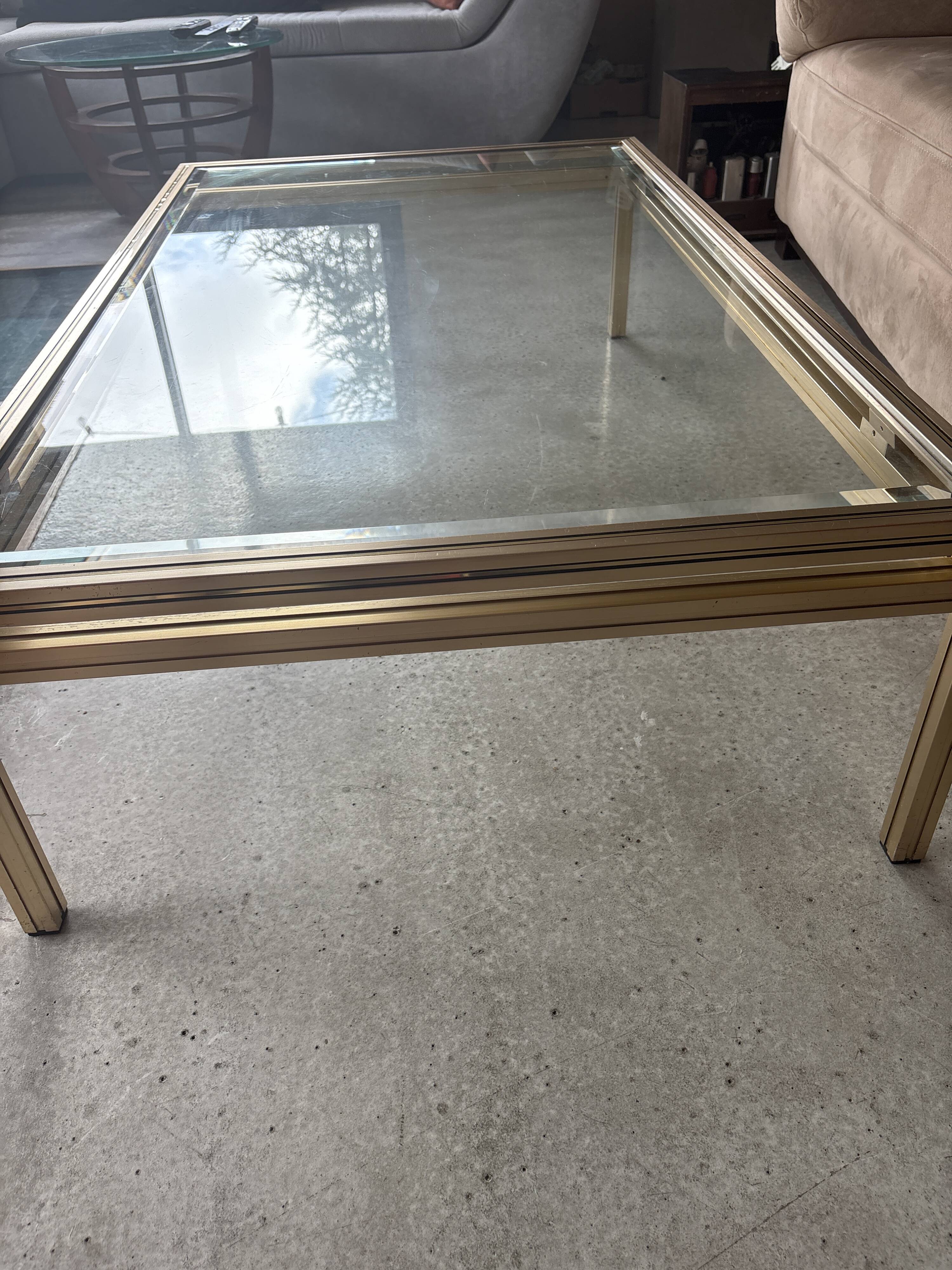 Brass/glass table designed by Pierre Vandel Paris