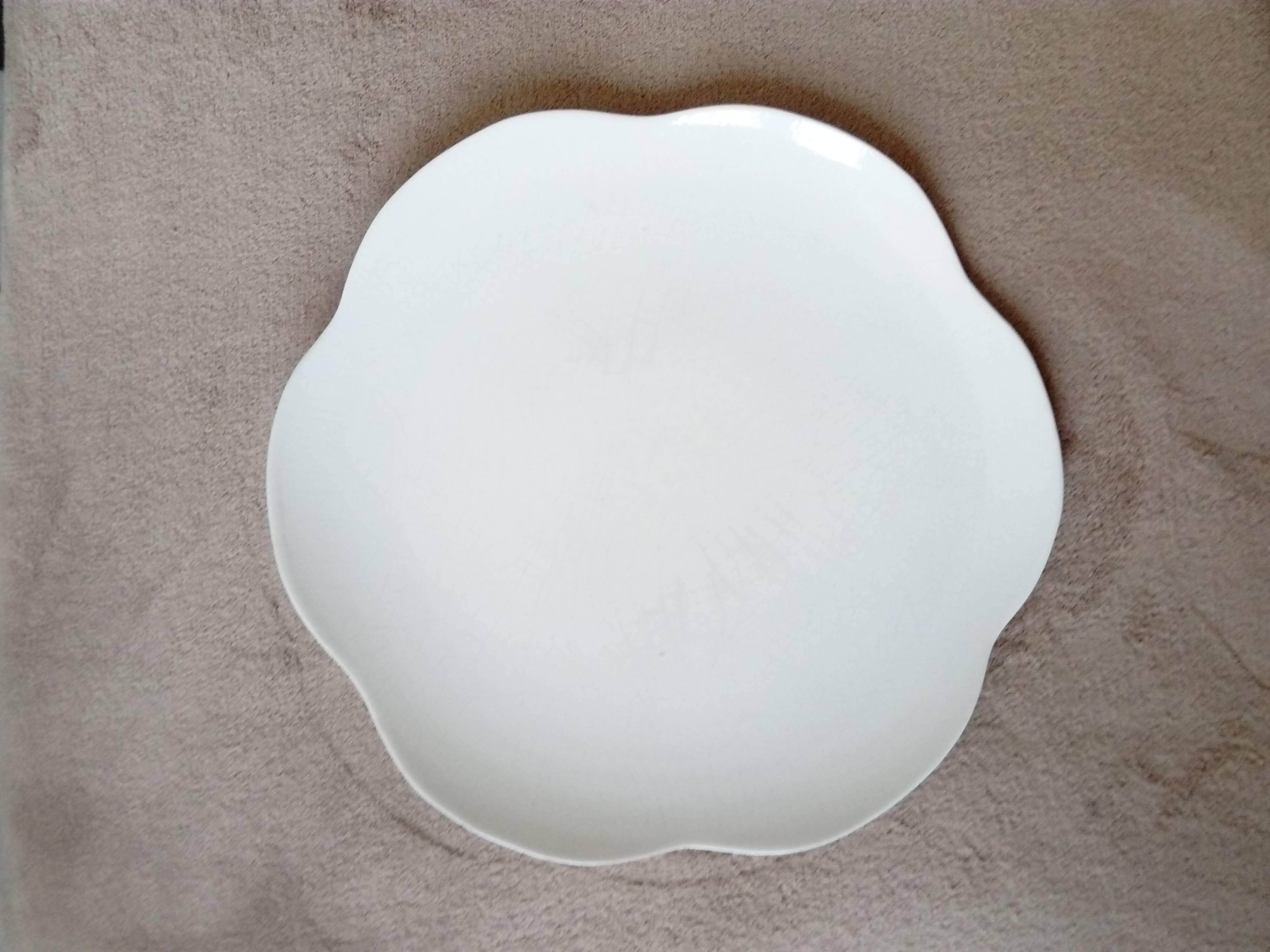 Large white multi-lobed pie or cake dish