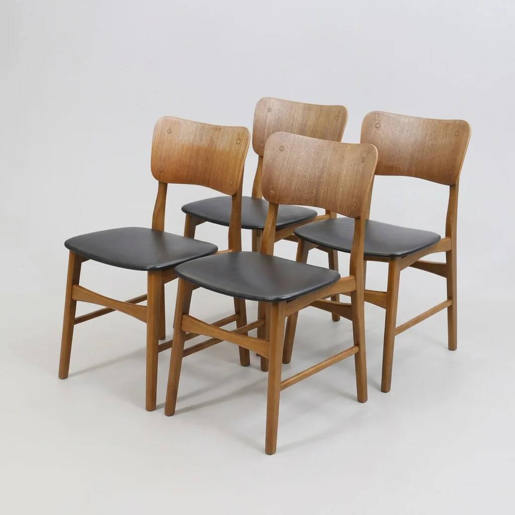 Set of 2 vintage Scandinavian chairs in teak and black faux leather by Kofod-Larsen, Denmark, 1960s.