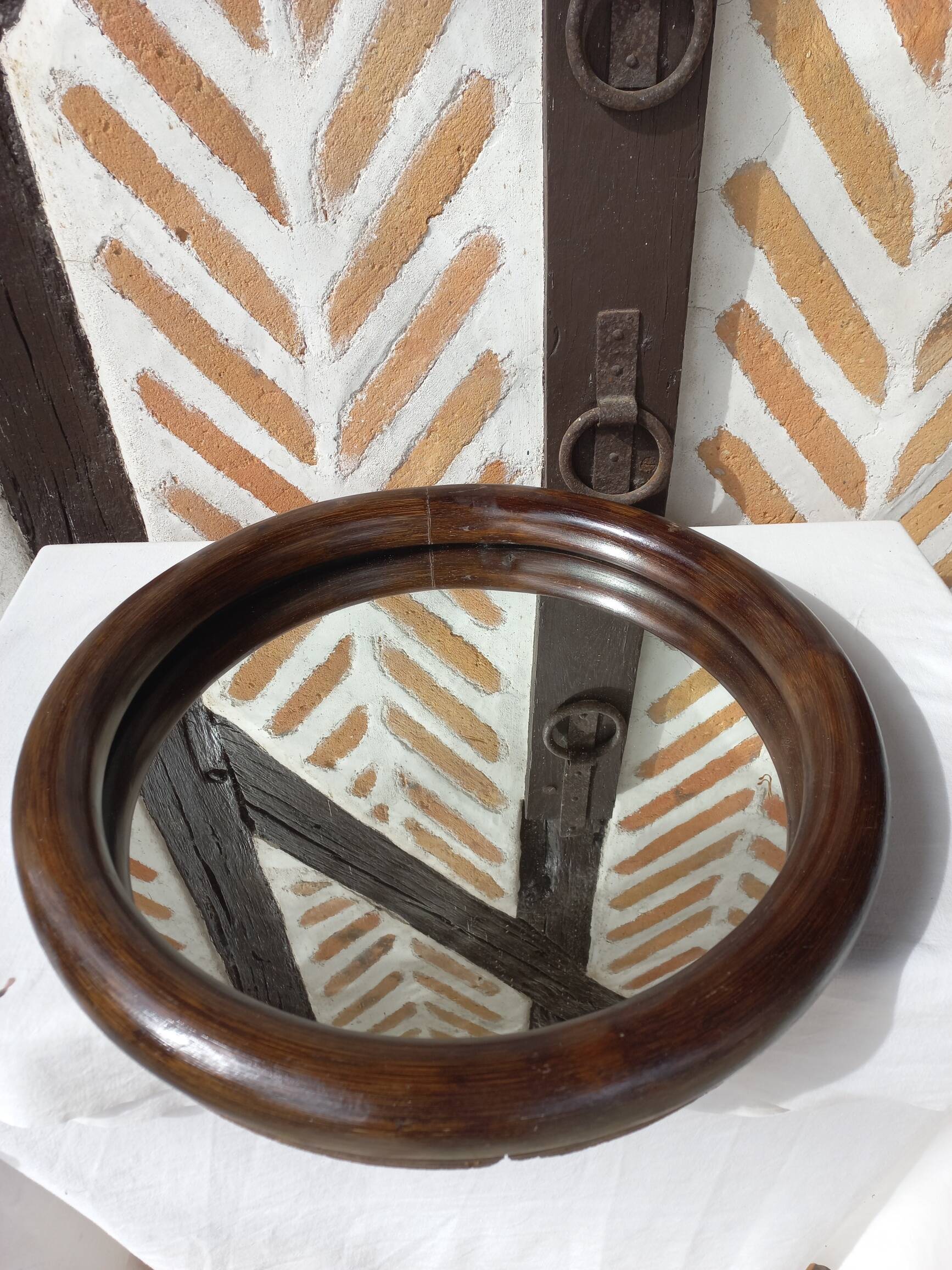 Vintage round bamboo mirror from the 1970s