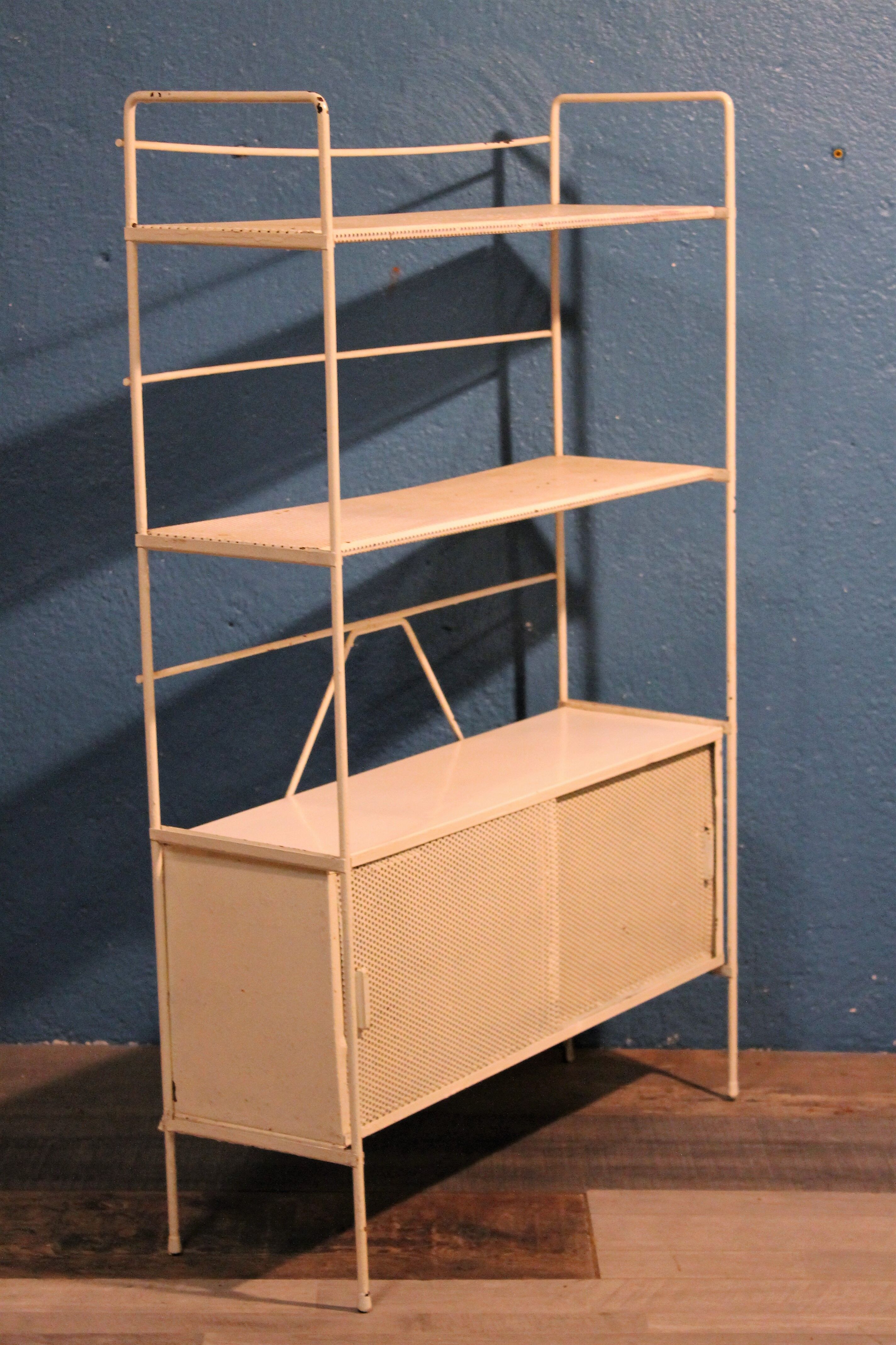 Perforated metal stand 1950