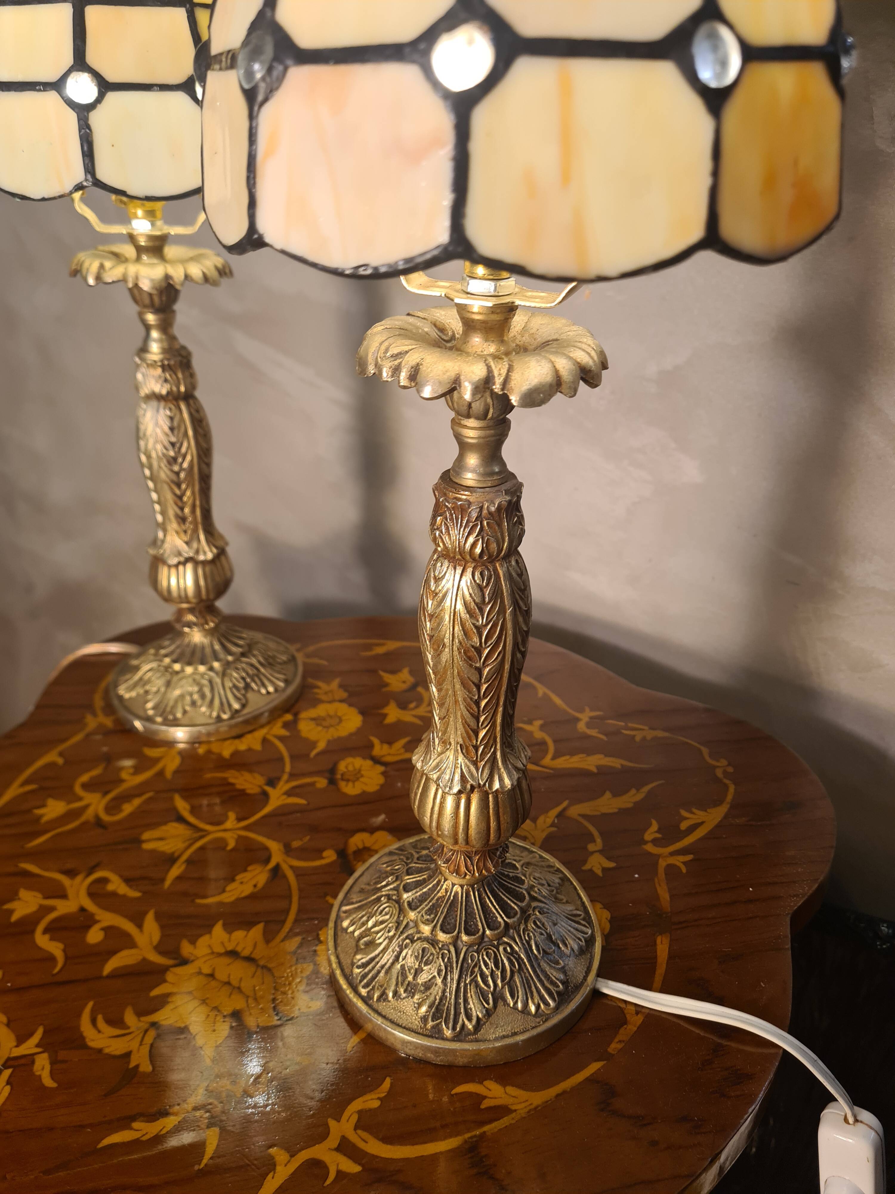 pair of bedside lamps in gilded bronze with glass shade