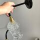 Pair of vintage electrified glass wall lamps