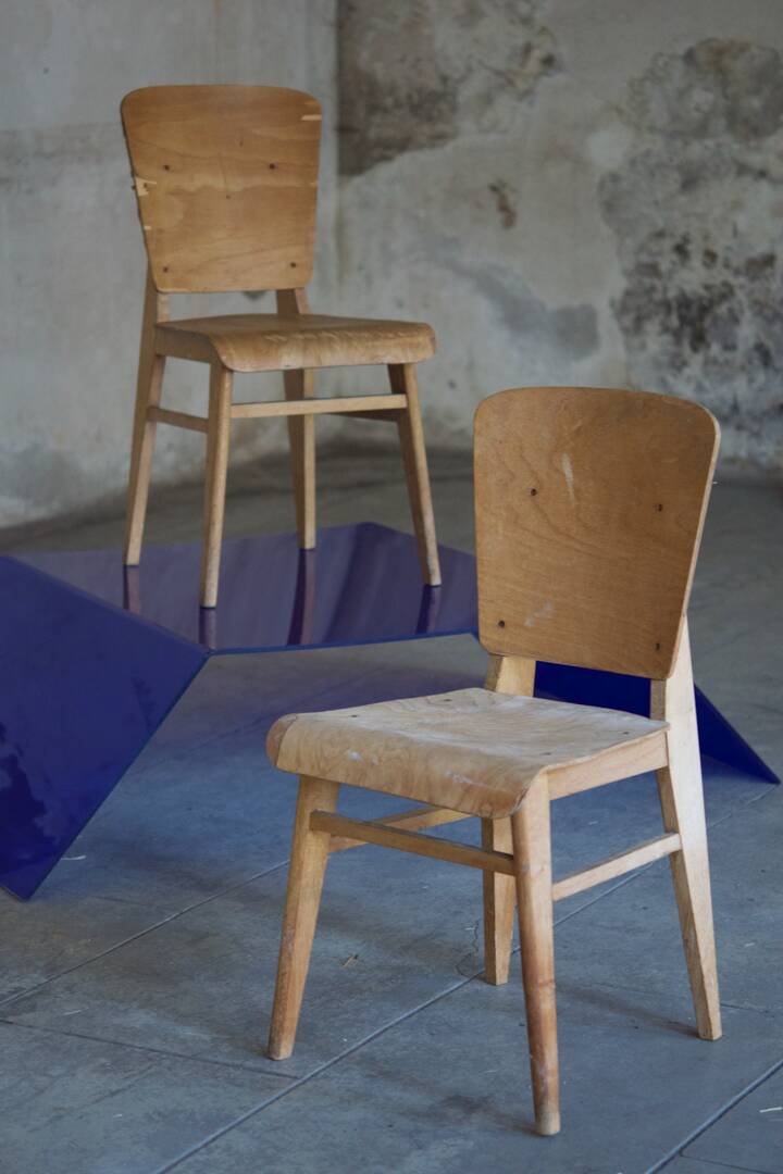 two  style wooden chairs