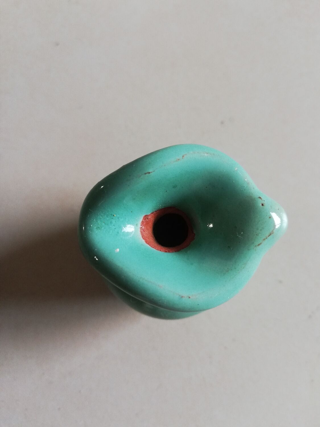 Very small turquoise soliflore in the shape of a ceramic jug