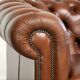 Very spacious 2-seater Chesterfield sofa in cow leather in a English look