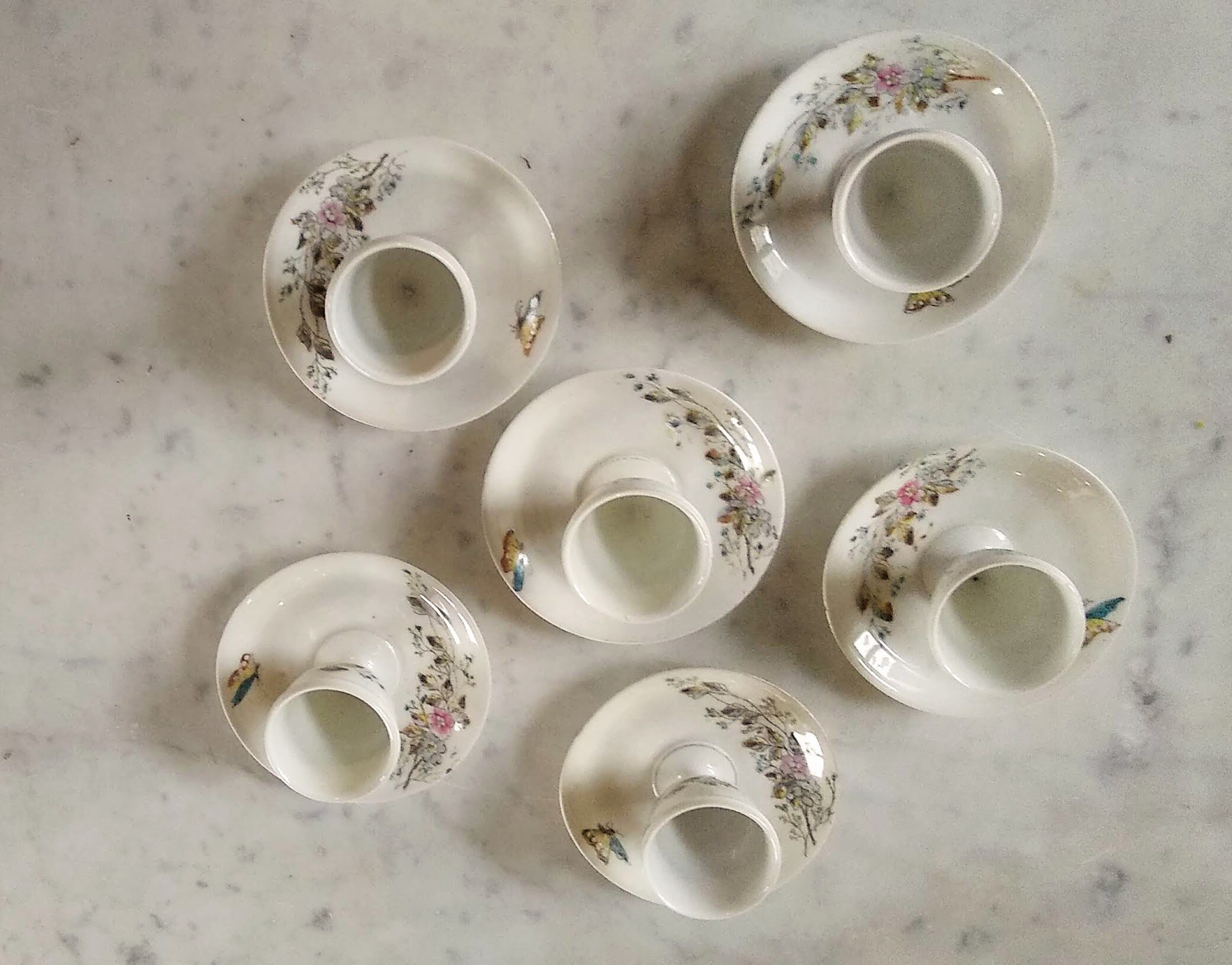 6 floral egg cups with their early 20th century porcelain bowl