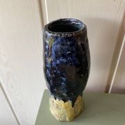 Signed terracotta vase