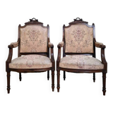 Pair of Louis XVI style queen-style armchairs in richly carved wood