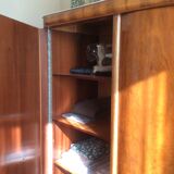 Three-door wardrobe in solid walnut