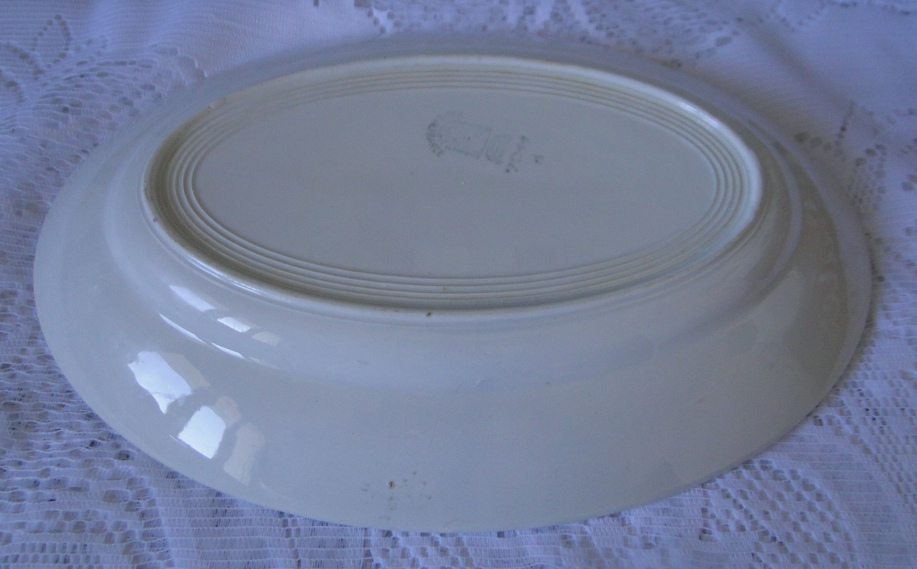Old oval dish in faience st Amand n° 7011 flower pattern