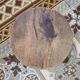 Old dark wood tripod stool