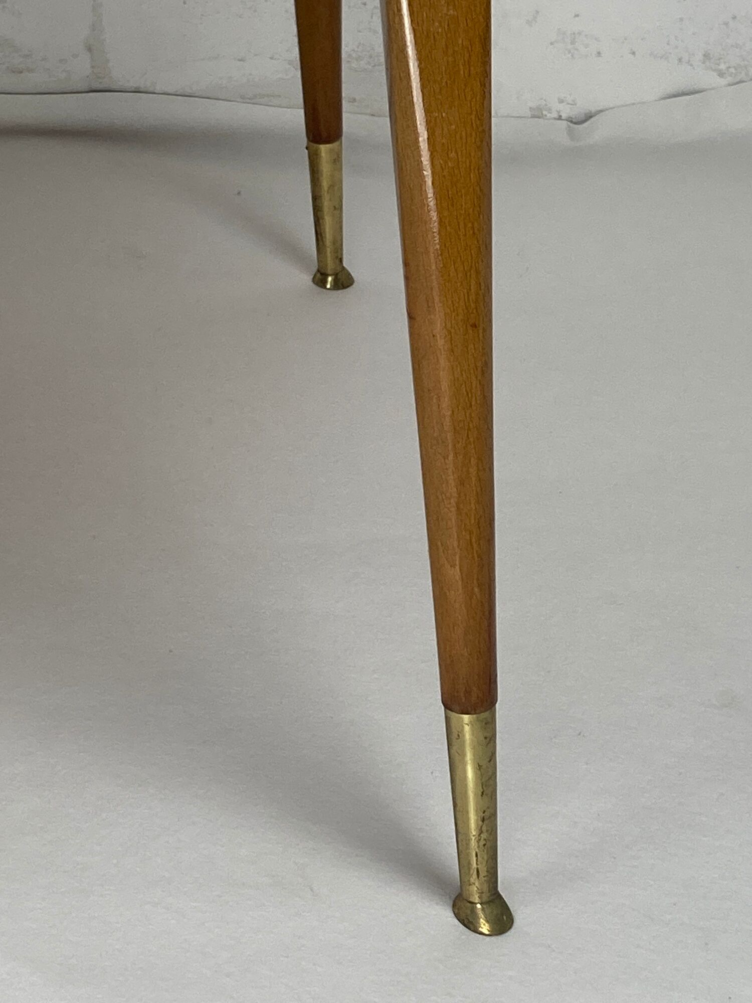 Italian round table with tapered brass leg ends, 1950s