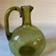 Green blown glass carafe