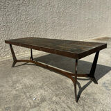 Coffee table with stone top and iron legs