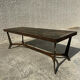 Coffee table with stone top and iron legs