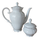 Porcelain teapot and sweetener