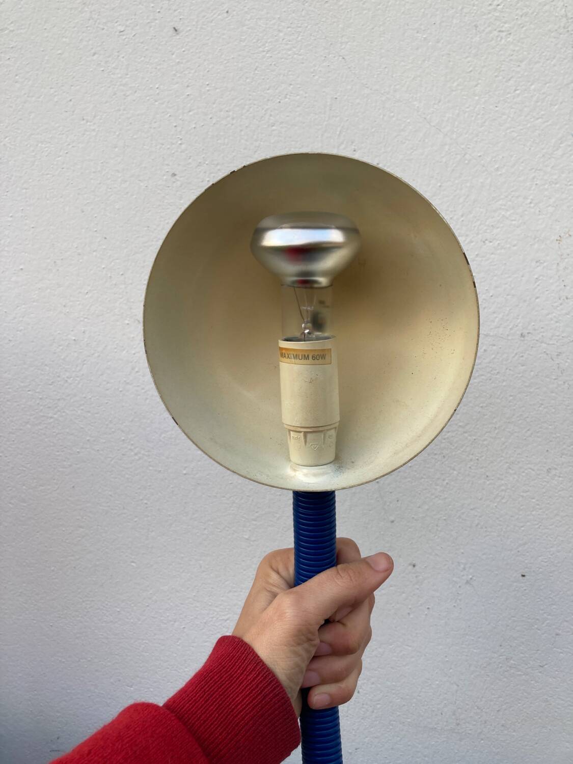 Articulated blue metal bedside lamp