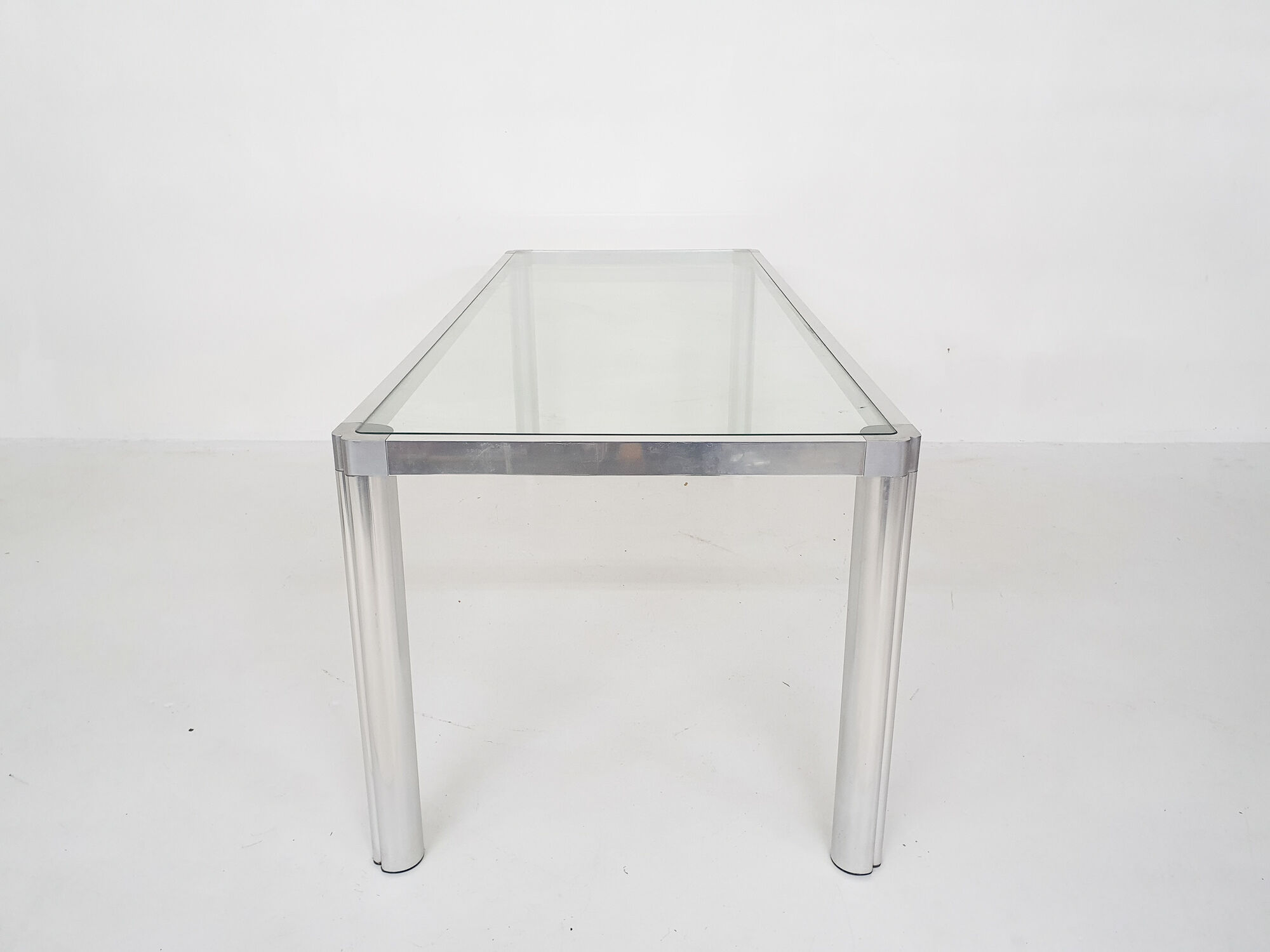 Glass and aluminum dining table by kho liang ie, the netherlands 1974