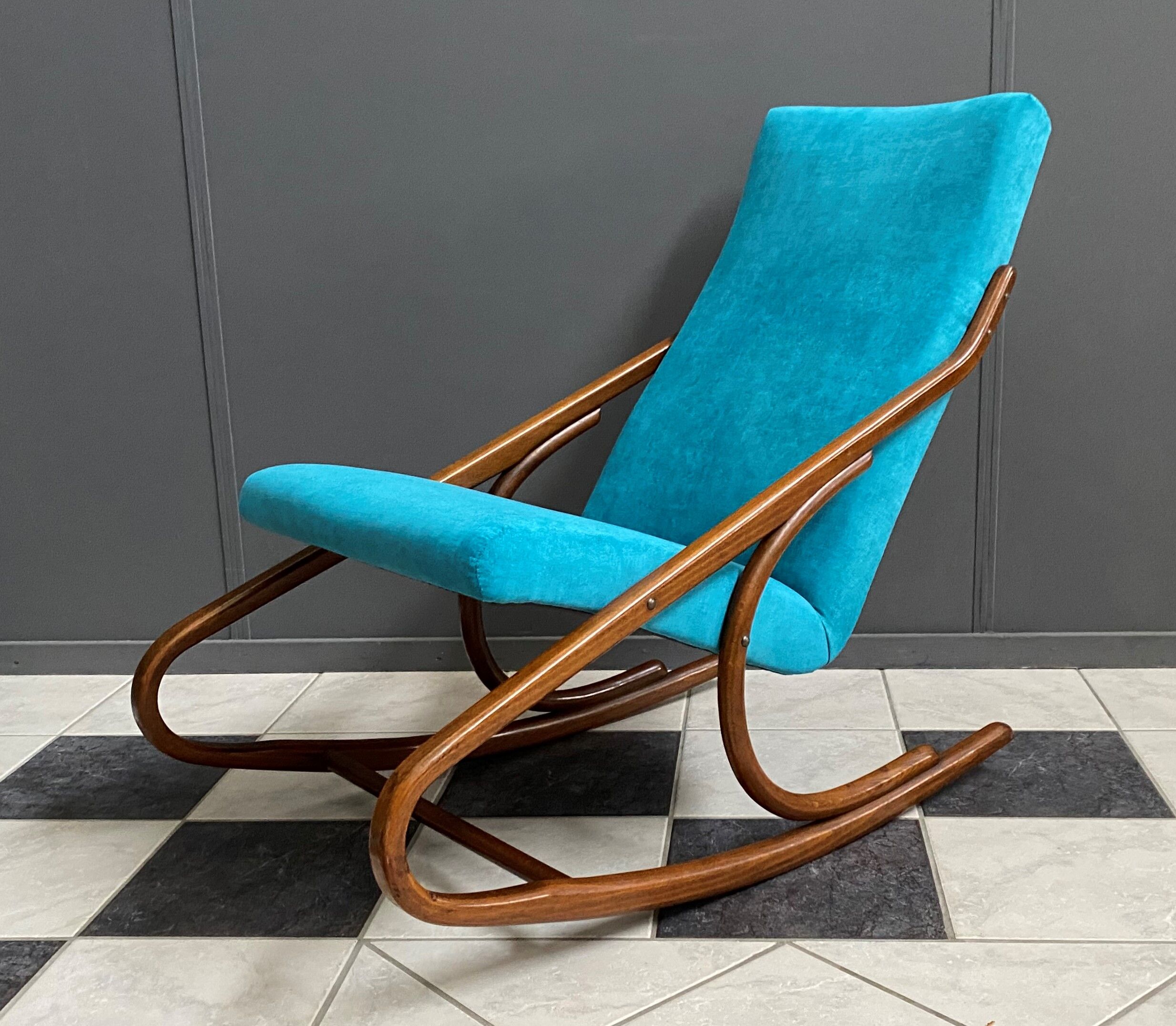 Ton, Thonet arm less rocking chair in blue velvet upholstery