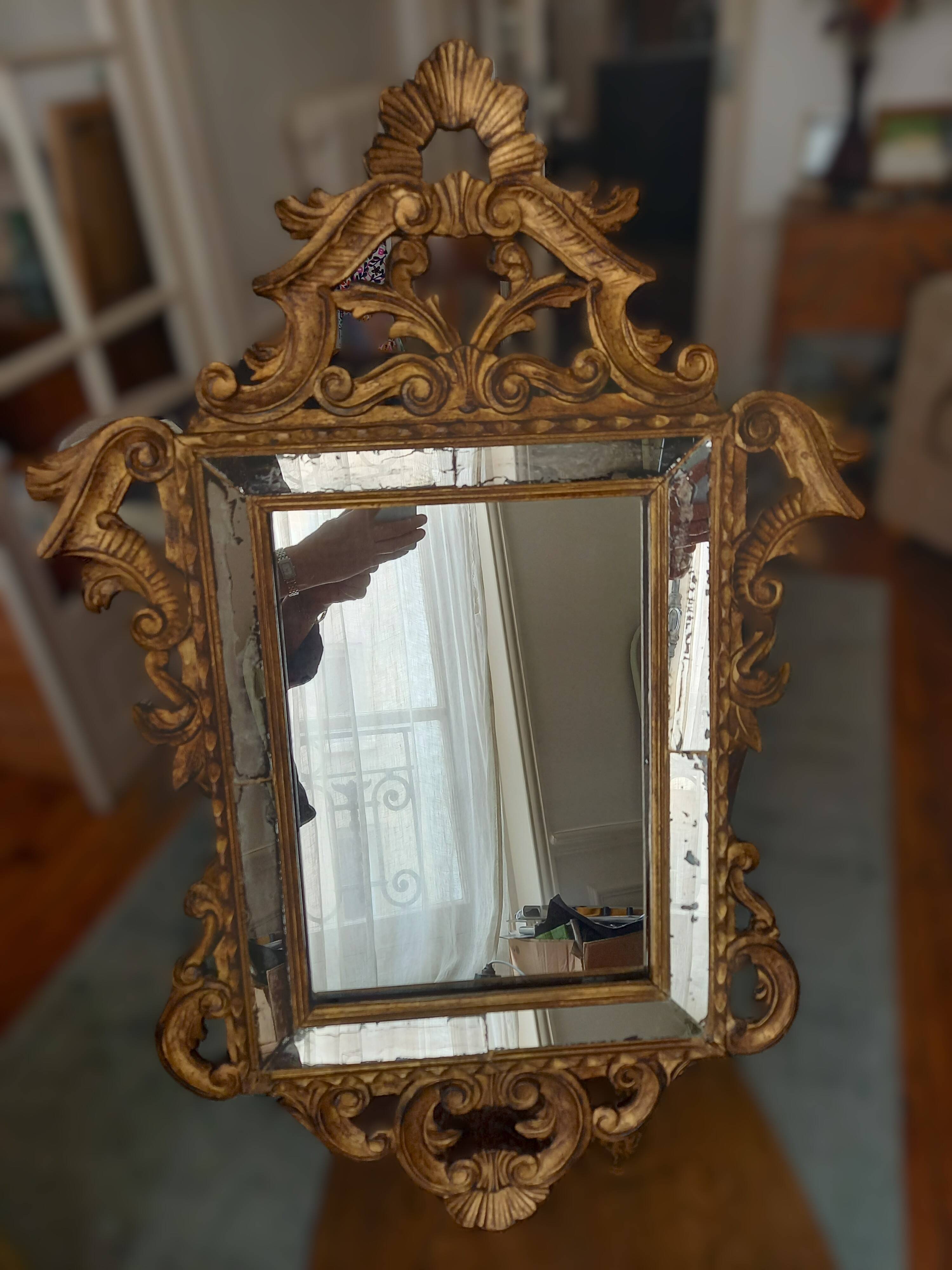 Antique gilded wooden mirror with mouldings, Louis XV style.