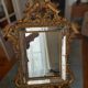 Antique gilded wooden mirror with mouldings, Louis XV style.