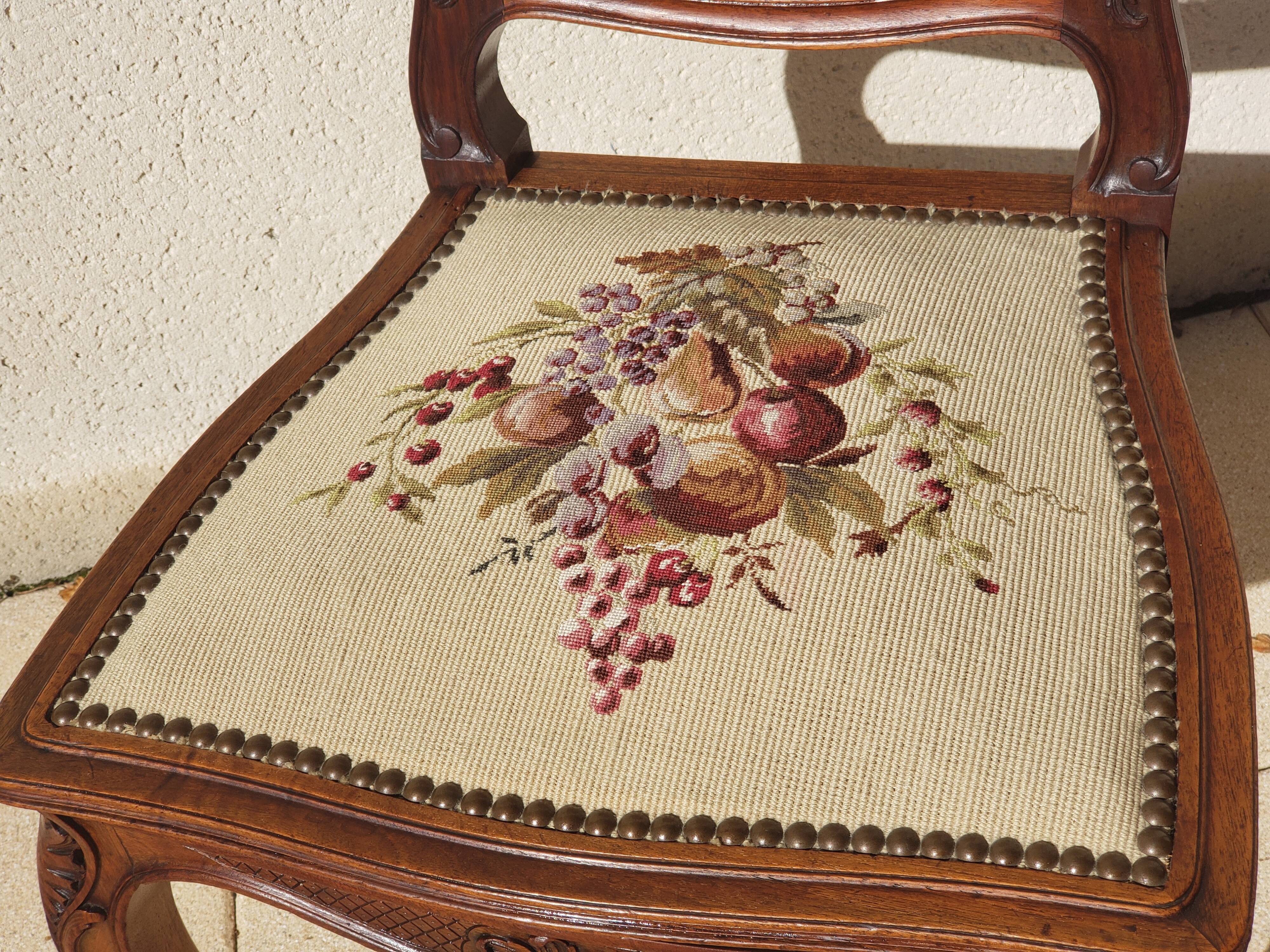 Antique Louis XV style chair in walnut