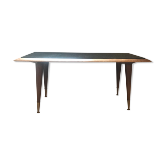 Vintage coffee table with compass feet and black glass top